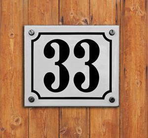 wood panel with number 33