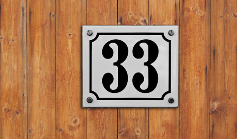 wood panel with number 33